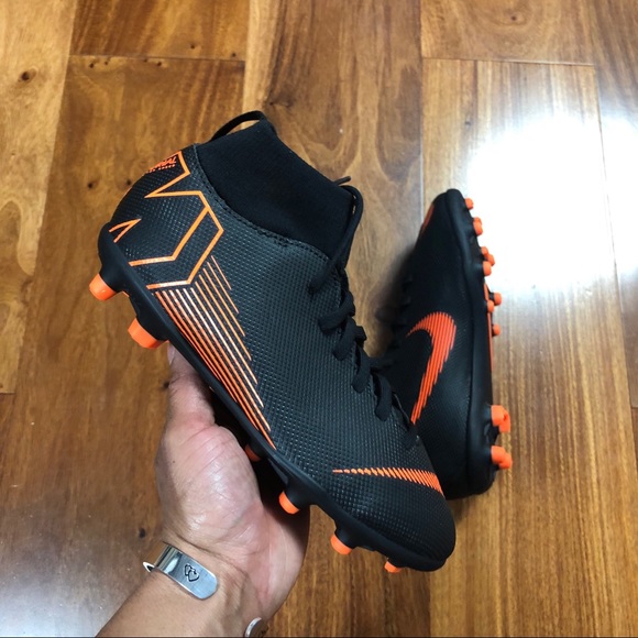 Nike Other - Boys Black and Orange Nike Mercurial Cleats.